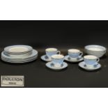A Modern Four Setting Doulton Dinner Service. White and Pale blue border.