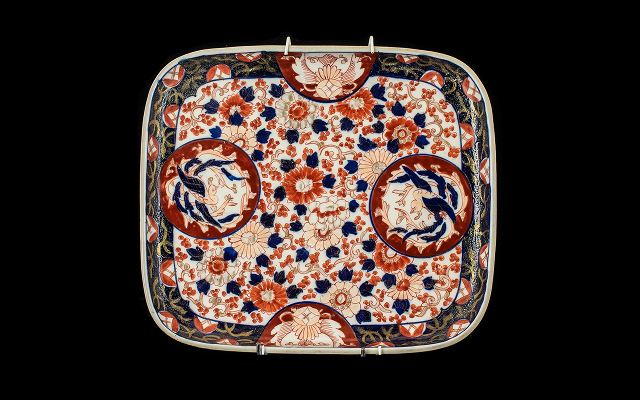 Imari Square Shaped Dish of typical palette, Meiji period. Decorated with birds in the roundels.