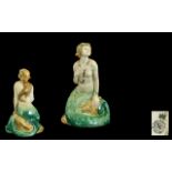 Royal Doulton Early Handpainted Figure stamped 1918. 'The Mermaid' green / cream colour way. HN 97.