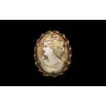 Ladies 9ct Gold Mounted Shell Cameo Brooch with 9ct gold attached safety chain.