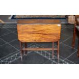 Small Drop-Leaf Mahogany Table with two side panels on legs with casters,