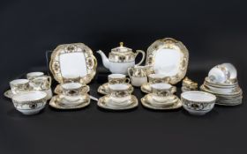 A Noritake Teaset circa 1920's. Design no No 44318. Golden Basket Pattern.