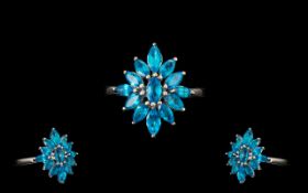 Neon Apatite Cluster Ring, marquise cuts of neon apatite, totalling 2,25cts, splaying outwards