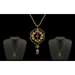 Victorian Period Attractive 9ct Gold Garnet and Seed Pearl Set Pendant with attached 9ct gold chain,