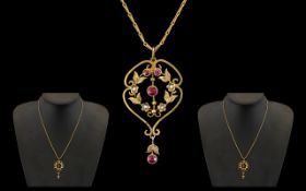 Victorian Period Attractive 9ct Gold Garnet and Seed Pearl Set Pendant with attached 9ct gold chain,