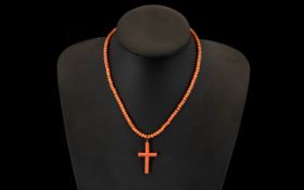 1920's Coral Beaded Necklace with Cross - 18" - 45 cm long. Plus a carved bone religious figure.