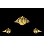 9ct Gold - Attractive Single Stone Citrine Set Dress Ring, Marked 9ct. The Oval Faceted Citrine of