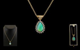 9ct Gold Nice Quality Pear Shaped Oval & Diamond Set Pendant on attached 9ct Gold Chain.