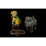 An Antique Chinese Figure of Foo Dog Sancai glazed. 6.5 inches high.