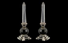 Pair Large Glass Obelisks, mounted on a sphere on stepped base of unusual form and unsigned.