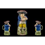 Staffordshire Antique Pratt Ware Style Toby Jug of small size with Toby holding a Jug of Ale with