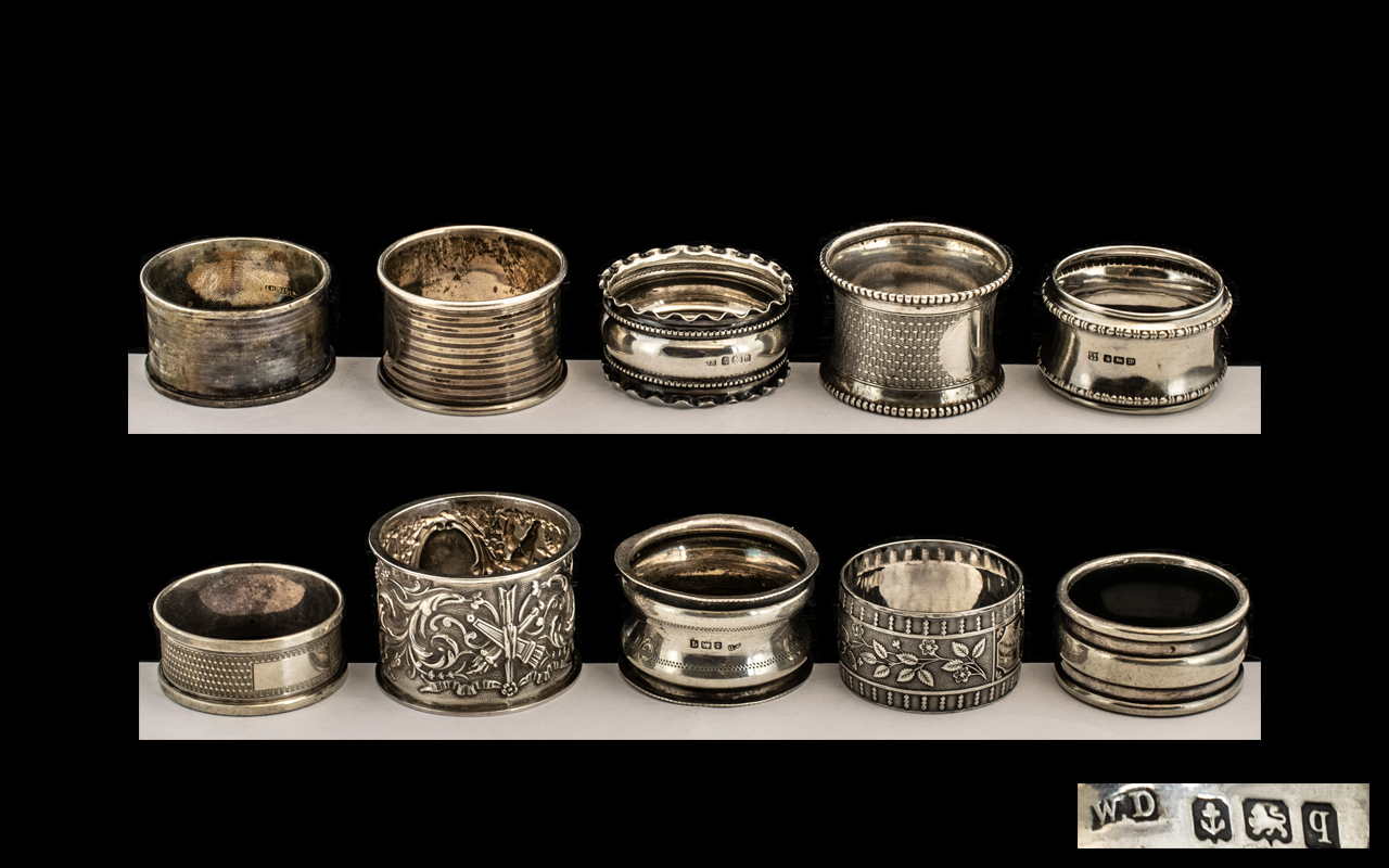 Silver Napkin Rings - a large collection of hallmarked silver napkin rings,