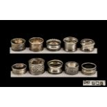 Silver Napkin Rings - a large collection of hallmarked silver napkin rings,