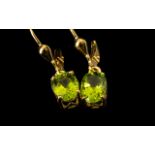 Peridot Solitaire Drop Earrings, oval solitaires of bright green peridot, each of 1.