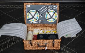 An Antler Fitted Wicker Picnic Hamper. In as new condition with original care leaflet.