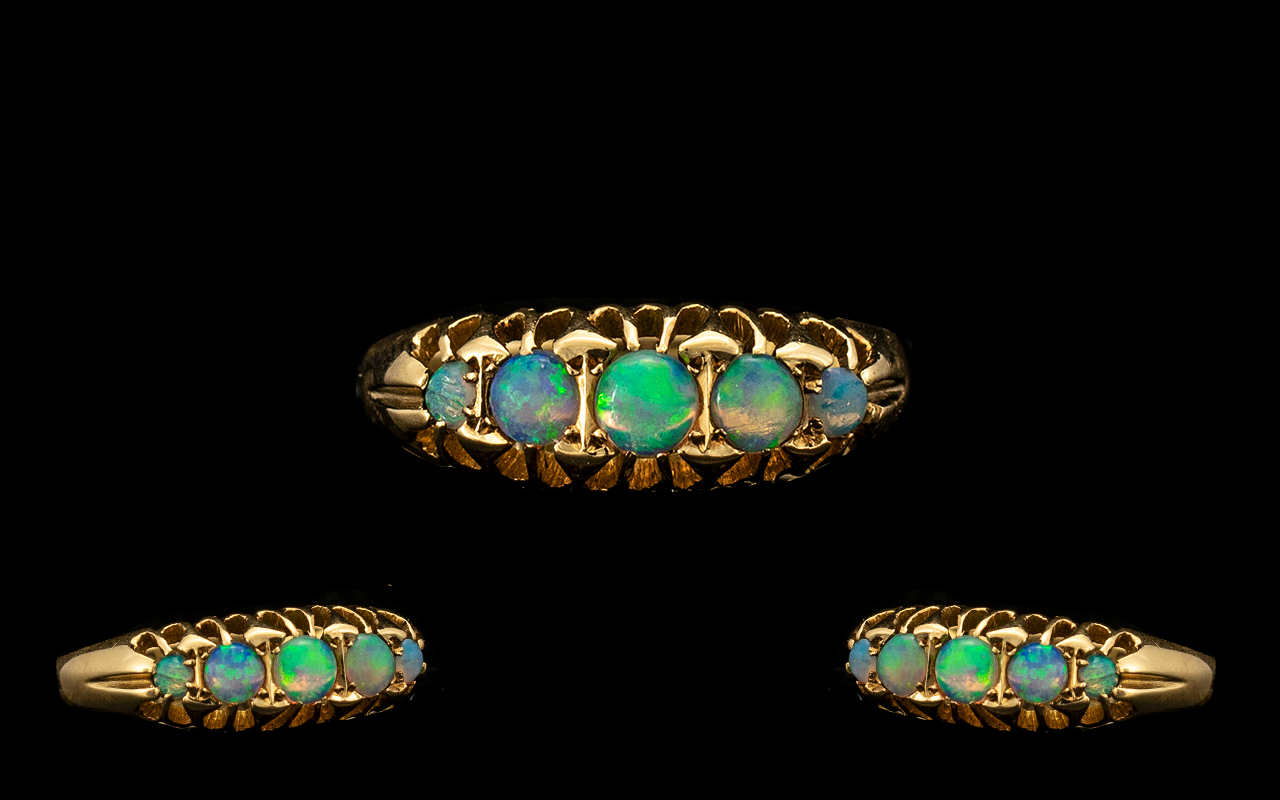 18ct Gold Attractive 5 Stone Opal Set Dress Ring. Gallery setting. Hallmark Birmingham 1919.