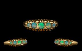 18ct Gold Attractive 5 Stone Opal Set Dress Ring. Gallery setting. Hallmark Birmingham 1919.