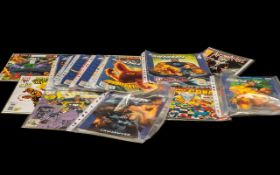 A Collection of 17 Marvel DC Comics and Avengers Magazines.