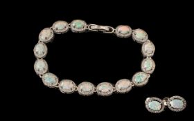 Beautiful Silver Opal Bracelet with matching earrings for pierced ears.