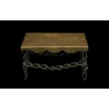 Unusual Antique Brass Topped Trivet Stool the four legs and cross-stretcher made from linked iron