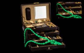 Collection of Vintage Costume Jewellery housed in a leather jewellery box with a top section and