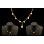9ct Gold Fancy Link Opal Necklace 16" chain set with six round opals and an oval opal drop.