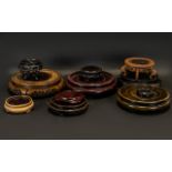 10 Chinese Oriental Wood Stands of various shapes and sizes.