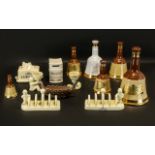 Collection of Bell's Wade Whiskey Decanters, six in total, various sizes. Also, two Lurpak toast