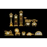 A Collection of Good Quality Gold Gilt Brass Miniature Clocks.