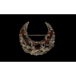 Antique Turkish Style Crescent Shaped Brooch with intricate silver leaf decorations,