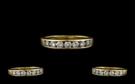 18ct Gold - Attractive Channel Set Diamond Ring, The Round Brilliant Cut Diamonds of Good Colour and