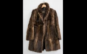 Ladies Three Quarter Length Fur Coat.