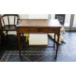 Edwardian Tooled Leather Top Mahogany Writing Desk with two front drawers with key, raised on four