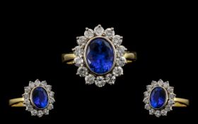 18ct Gold and Platinum Superb Quality - Blue Tanzanite and Diamond Set Cluster Ring. The Oval