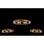 18ct Gold - Excellent Quality Seven Stone Diamond and Ruby Set Dress Ring. Full Hallmark for 750 -