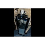 Art Deco Style Mirror. Vintage style Art Deco wall mirror in fan shape with black and mirrored