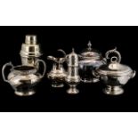A Collection of Silver Plate to include a three piece teaset, a cocktail shaker,