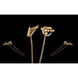 Antique Period 15 ct Gold Seed Pearl Set Stick Pin Marked 15ct together with a 9ct Gold Stick Pin