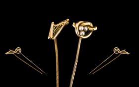 Antique Period 15 ct Gold Seed Pearl Set Stick Pin Marked 15ct together with a 9ct Gold Stick Pin