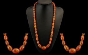 Butterscotch Coloured Graduated Beaded Necklace from the 1920s. Condition all aspects excellent.