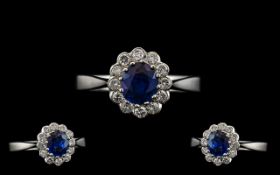 18ct White Gold 1950's Sapphire and Diamond Set Cluster Ring the central faceted sapphire of