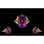 9ct Gold Attractive Single Stone Amethyst Set Dress Ring the faceted amethyst of excellent rich