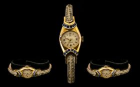 Jovial Swiss Art Deco Ladies Wrist Watch, 10 microns of gold plate set with blue and white gem