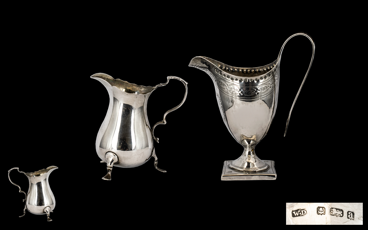 George III Helmet Shaped Silver Milk Jug - on a square base with studded border.