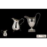 George III Helmet Shaped Silver Milk Jug - on a square base with studded border.