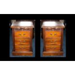 Matched Pair of Mahogany Bedside Cabinets with a carved frieze to the top.