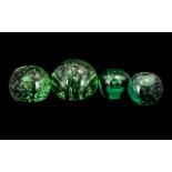 Collection Of Four Victorian Green Glass Dumps/Paperweights Of Typical Form, The Largest. Height 4.