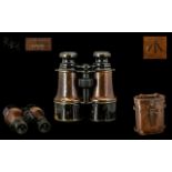 Military Interest - French WWI 1917 Binoculars housed in a brown leather case embossed with the