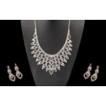 White Crystal Openwork Bib Necklace and Drop Earrings Set, the necklace with fluid movement,