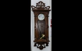 Austrian Oak Cased Double Brass Weighted Vienna Wall Clock.